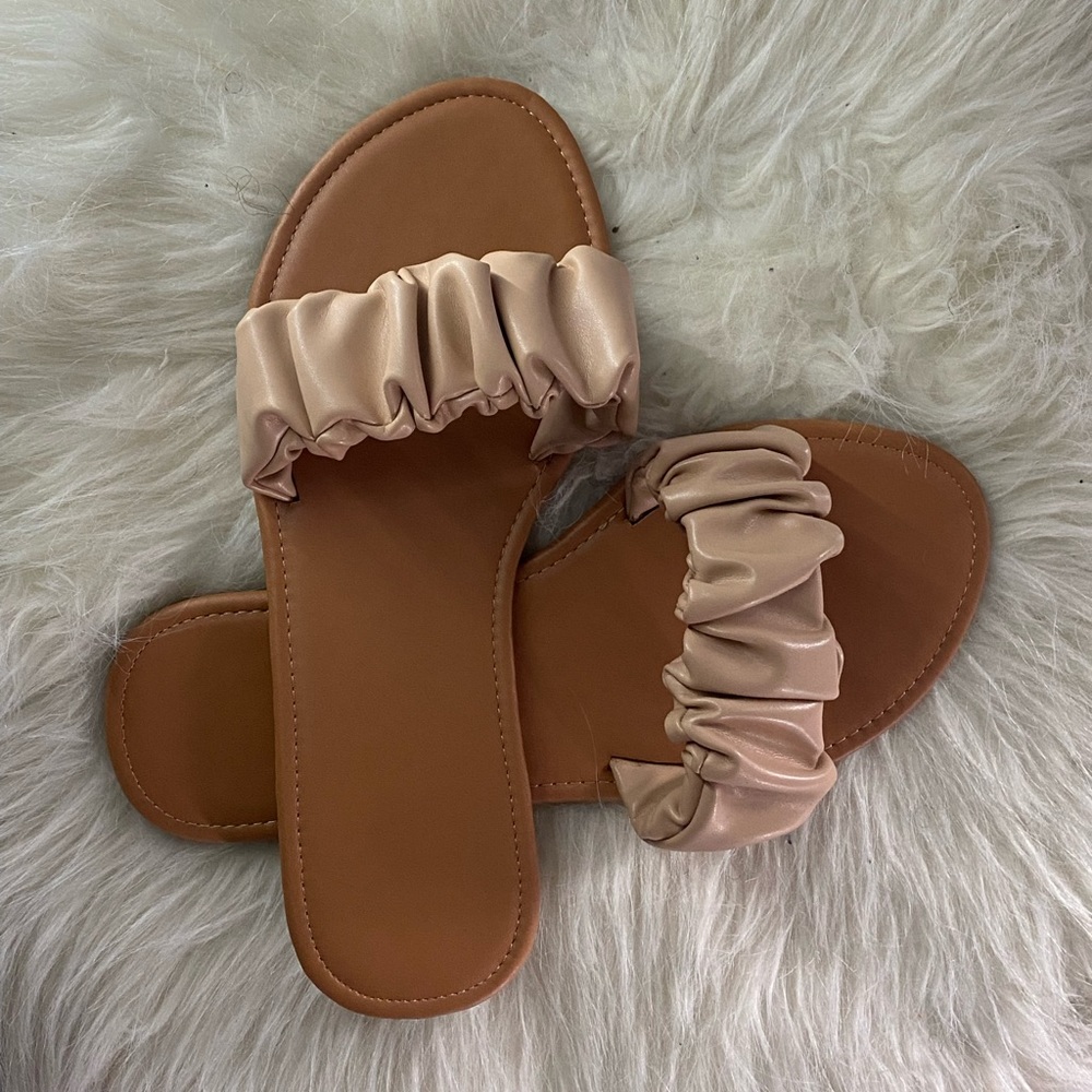 Nude sandals.